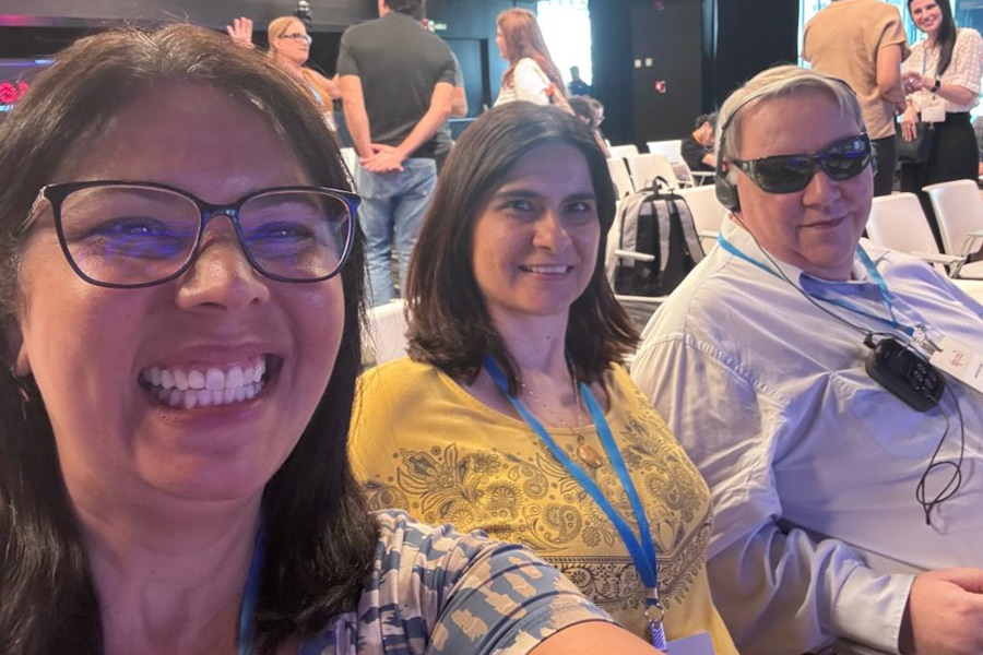 Aracy Maria van den Berg, Cláudia Nascimento e Laercio Sant'anna na plateia do evento.